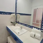 Acogedor En *